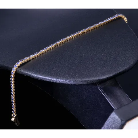 Tennisarmband mit funkelnden, dunkelblauen Zirkonia aus edlem 585 14K Gelbgold in (ca. 18,5 cm Länge)