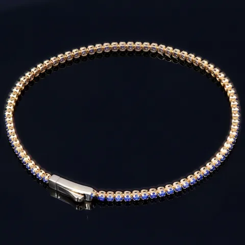 Tennisarmband mit funkelnden, dunkelblauen Zirkonia aus edlem 585 14K Gelbgold in (ca. 18,5 cm Länge)