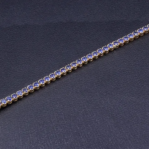 Tennisarmband mit funkelnden, dunkelblauen Zirkonia aus edlem 585 14K Gelbgold in (ca. 18,5 cm Länge)