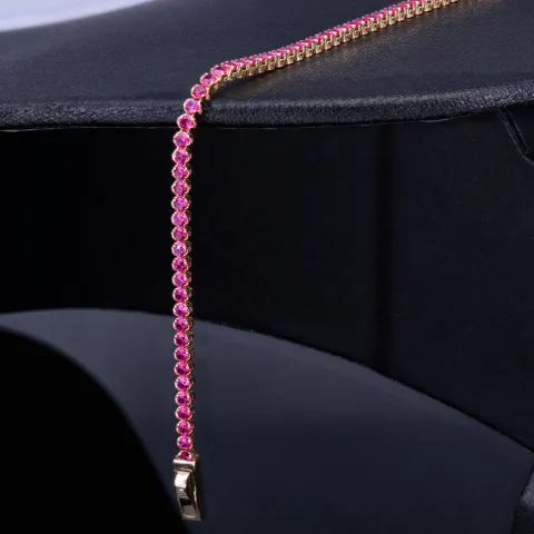 Tennisarmband mit leuchtenden, rosa-rot, pinken Zirkoniasteinen aus hochwertigem 585 14K Gold in (ca. 19 cm Länge)