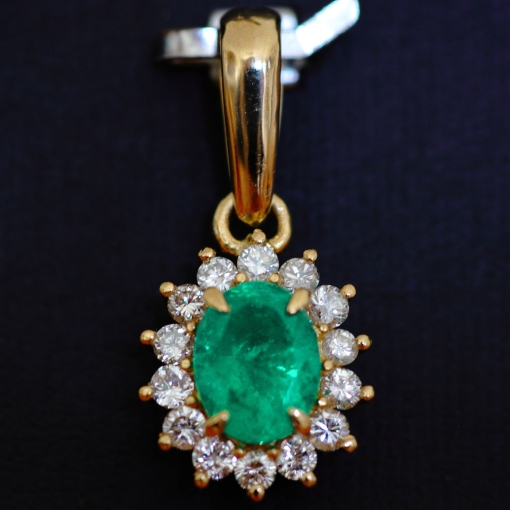 Kostbarer Smaragd-Anhänger in 18K 750 Gold bestückt mit einem edlen, kolumbianischen Smaragd (ca. 1,31 ct.) und 14 Diamanten (gesamt ca. 0,42 ct.)