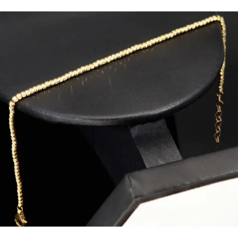 Längenverstellbares Armband, mit vielen kleinen Goldkügelchen bestückt, aus 585 14K Gelbgold in ca. 17,5 - 20 cm Länge