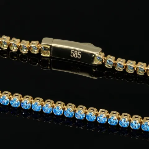 Trendiges Tennisarmband mit funkelnd, blauen Zirkoniasteinen aus 585 14K Gold in (ca. 16,5 cm Länge)
