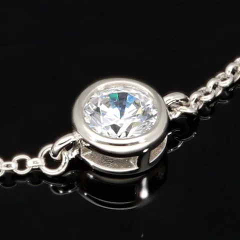 Edles Schmuck-Set aus funkelndem 925er Sterling Silber - Elegantes Armband und funkelnde Ohrstecker mit brillantgeschliffenen Zirkoniasteinen (Diamantimitat)