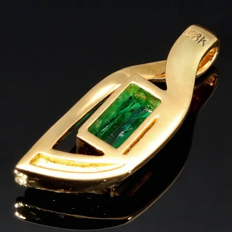 Außergewöhnlicher Smaragdanhänger in 18K / 750 Gold mit einem beeindruckenden kolumbianischen Smaragd von ca. 1 ct und 5 Diamanten (gesamt ca. 0,12 ct.)
