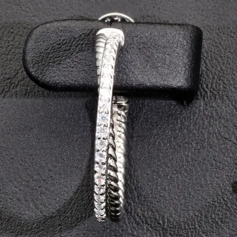 Glänzende Creolen / Ohrringe aus 925 Silber, rhodiniert und poliert, besetzt mit vielen, kleinen funkelnden Zirkonia-Steinen im Brillantschliff
