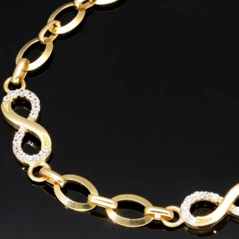 Glänzendes Goldarmband mit Infinity-Elementen mit weißen Zirkoniasteinen in 585 14K Gold in (ca. 18,5 cm Länge, ca. 6 mm Breite)