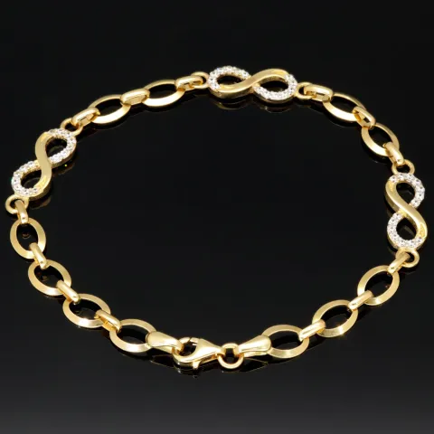 Glänzendes Goldarmband mit Infinity-Elementen mit weißen Zirkoniasteinen in 585 14K Gold in (ca. 18,5 cm Länge, ca. 6 mm Breite)