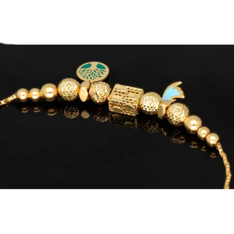 Außergewöhnliches Goldarmband mit detailreichen, eingearbeiteten Elementen und Goldperlen (585er 14k), ca. 19cm lang