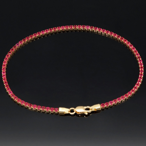 Hochwertiges produziertes 585 / 14K Gold Tennisarmband mit strahlenden pink-lila Zirkoniasteinen (ca. 18,5 cm)