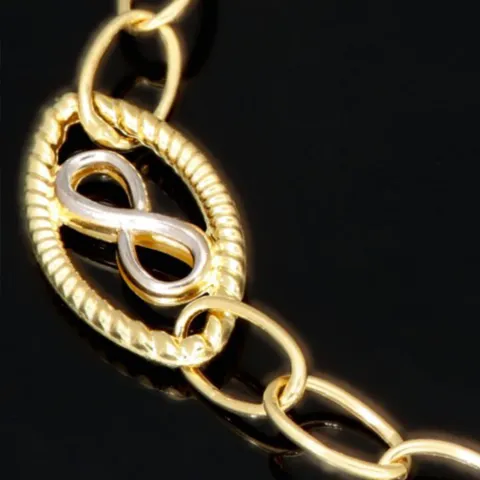 Bicolor-Ankerarmband aus 14K (585) Gold – Kombination aus Gelb- und Weißgold mit filigran gearbeiteten Infinity-Elementen (ca. 20,5 cm)
