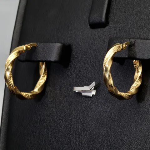 Glänzende Greco-Creolen in zeitlosem Twist-Design aus funkelndem 585er / 14K Gold