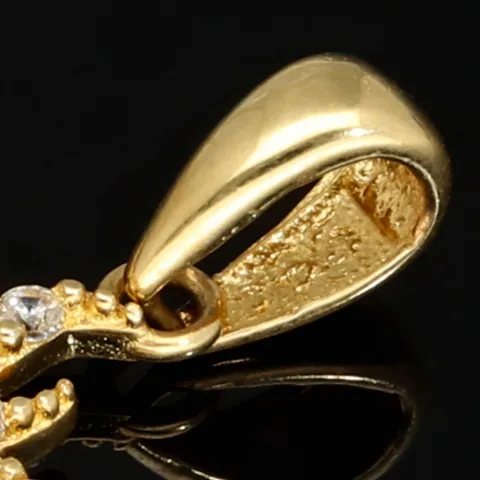 Funkelnder Anhänger aus 585 / 14 Karat Gold mit dem Motiv der Sonne, besetzt mit feinen Zirkonia