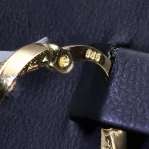 Glänzende Twist - Creolen in stilvollem Greco - Design aus hochwertigem Gold (585 / 14K Gelbgold)