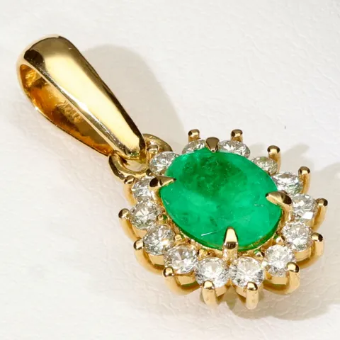 Kostbarer Smaragd-Anhänger in 18K 750 Gold bestückt mit einem edlen, kolumbianischen Smaragd (ca. 1,31 ct.) und 14 Diamanten (gesamt ca. 0,42 ct.)