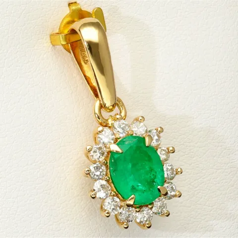 Kostbarer Smaragd-Anhänger in 18K 750 Gold bestückt mit einem edlen, kolumbianischen Smaragd (ca. 1,31 ct.) und 14 Diamanten (gesamt ca. 0,42 ct.)