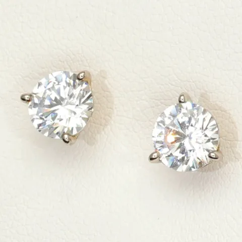 Zeitlos schöne Ohrstecker aus rhodiniertem 925er Sterling Silber, die mit brillant geschliffenen Zirkonia (Diamantimitation)