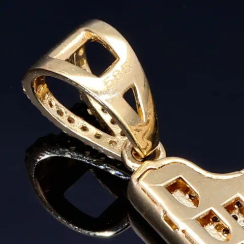 Exklusiver Pistolen-Anhänger aus 585 / 14K Gold mit leuchtenden Zirkoniasteinen