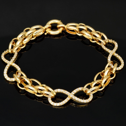 Exklusives Goldarmband mit eingearbeiteten Unendlichkeits-Elementen präzise besetzt mit weißen Zirkoniasteinen in 585 14K Gold in (ca. 20 cm Länge, ca. 9 mm Breite)