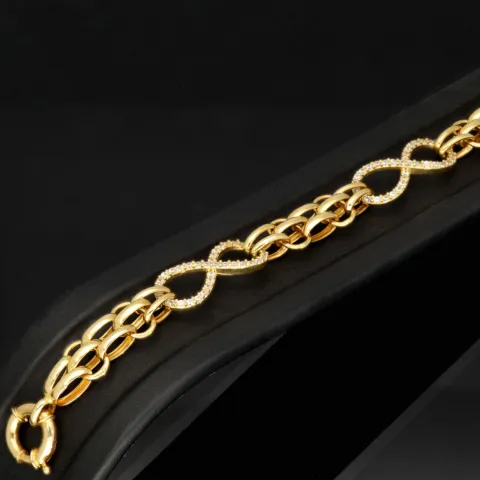 Exklusives Goldarmband mit eingearbeiteten Unendlichkeits-Elementen präzise besetzt mit weißen Zirkoniasteinen in 585 14K Gold in (ca. 20 cm Länge, ca. 9 mm Breite)