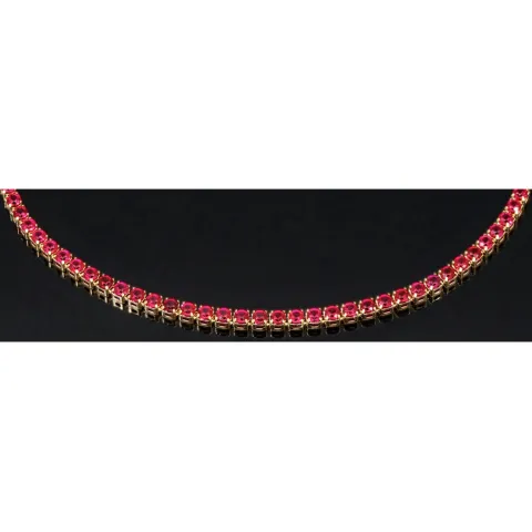 Fein gearbeitetes Tennisarmband aus edlem 585 / 14K Gold mit funkelnden pink-lila Zirkoniasteinen besetzt (ca. 17,5 cm)