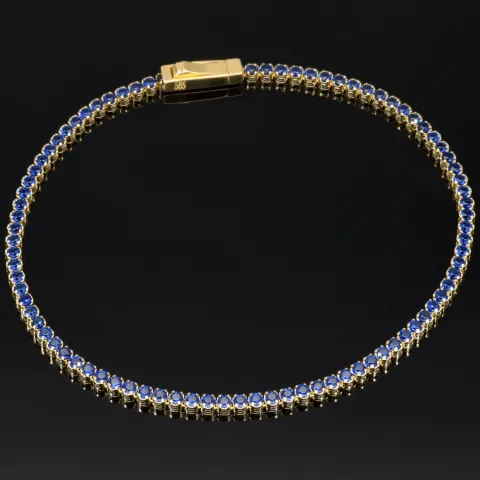 Trendiges Tennisarmband mit funkelnden, dunkelblauen Zirkonia aus hochwertigem 14K 585er Gold in (ca. 18,5 cm Länge)