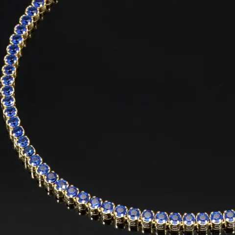 Trendiges Tennisarmband mit funkelnden, dunkelblauen Zirkonia aus hochwertigem 14K 585er Gold in (ca. 18,5 cm Länge)