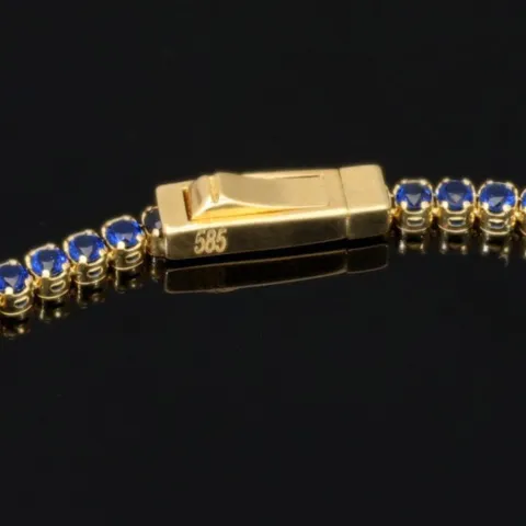 Trendiges Tennisarmband mit funkelnden, dunkelblauen Zirkonia aus hochwertigem 14K 585er Gold in (ca. 18,5 cm Länge)