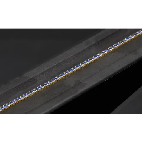 Trendiges Tennisarmband mit funkelnden, dunkelblauen Zirkonia aus hochwertigem 14K 585er Gold in (ca. 18,5 cm Länge)