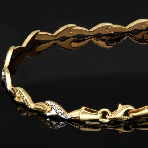Exklusiv designtes Goldarmband aus hochwertigem 585er 14K Bicolor Gold in Gelb- und Weißgold (ca. 19 cm Länge, 5 mm Breite)