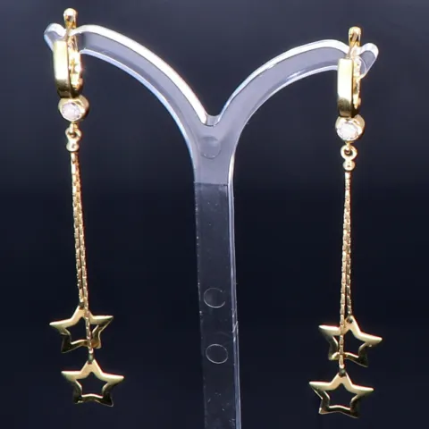 bezaubernde, hängende Sternchen - Ohrringe mit eingefasstem Zirkonia in 585er (14K) Gelbgold