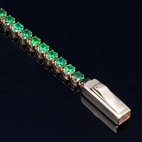 Glänzendes Tennisarmband mit leuchtenden, hellgrünen Zirkoniasteinen aus hochwertigem 585 14K Gold in (ca. 16 cm Länge)