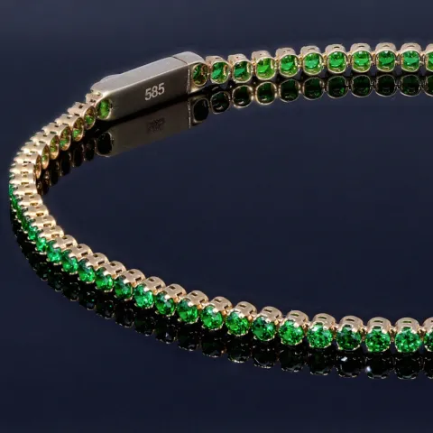 Glänzendes Tennisarmband mit leuchtenden, hellgrünen Zirkoniasteinen aus hochwertigem 585 14K Gold in (ca. 16 cm Länge)