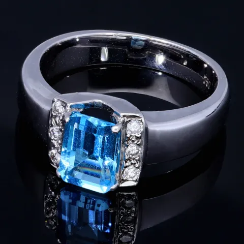 Ring für Damen in 750 18 Karat Weißgold mit 6 Brillanten und einem intensiv türkisen, großen Topas - Stein handgefertigt in Ringgröße 58