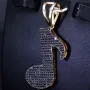 Musiknoten - Anhänger - Note aus glänzendem 585 14K Gold besetzt mit schwarzen Zirkonia