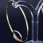 Elegante, glänzende Creolen in edlem 585 / 14K Bicolor Gold