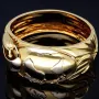 Wempe Markenschmuck: Aufwendig produzierter und massiver Armreif für Damen in exklusivem Design mit "Globus und Segelschiff-Motiv" aus Bicolor Gold 18K / 750 Gelbgold und Weißgold (Maße Innen: 5,7cm * 5,3cm)