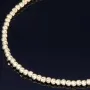 Längenverstellbares Infinity-Armband bestehend aus vielen kleinen Goldkügelchen aus 585 14K Gelbgold in ca. 18,5 - 20 cm Länge mit Zirkoniastein