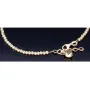 Längenverstellbares Infinity-Armband bestehend aus vielen kleinen Goldkügelchen aus 585 14K Gelbgold in ca. 18,5 - 20 cm Länge mit Zirkoniastein