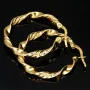 Exquisite Creolen mit Twist - Design aus Gold (585er 14K Gelbgold)