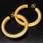 Twist - Creolen in zeitlosem Design aus funkelndem 333er / 8K Gold