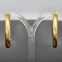 Twist - Creolen in zeitlosem Design aus funkelndem 333er / 8K Gold