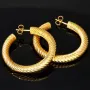 Twist - Creolen in zeitlosem Design aus funkelndem 333er / 8K Gold