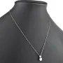 Hochwertig produziertes Schmuckset aus edlem 925er Sterling Silber, bestehend aus einer filigranen Ankerkette und einem Anhänger mit einem größeren in Krappen eingefassten, brillantgeschliffenen Zirkonia (Diamantimitat)