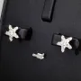 Glänzende Stern-Ohrstecker aus hochwertigem 925er Sterlingsilber mit funkelnden Zirkonia in Krappen gefasst