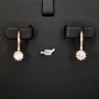 Glänzende Ohrringe aus 925er Silber Rosévergoldet mit funkelnden Zirkonia (Diamant-Imitation-Steine, Brillantschliff)