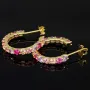 Zeitlos elegante Creolen aus vergoldetem 925 Sterling Silber mit 32 funkelnden Multicolor Zirkonia (Brillantschliff)