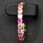 Zeitlos elegante Creolen aus vergoldetem 925 Sterling Silber mit 32 funkelnden Multicolor Zirkonia (Brillantschliff)