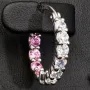 Trendige Creolen / Ohrringe aus 925er Silber, rhodiniert und hochglanzpoliert, veredelt mit weißen und rosa Zirkonia-Steinen im Brillantschliff (Diamantimitationen)