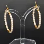 Vergoldete Creolen / Ohrringe aus 925 Sterling Silber mit 58 Zirkonia im Brillantschliff (Diamantimitationen)